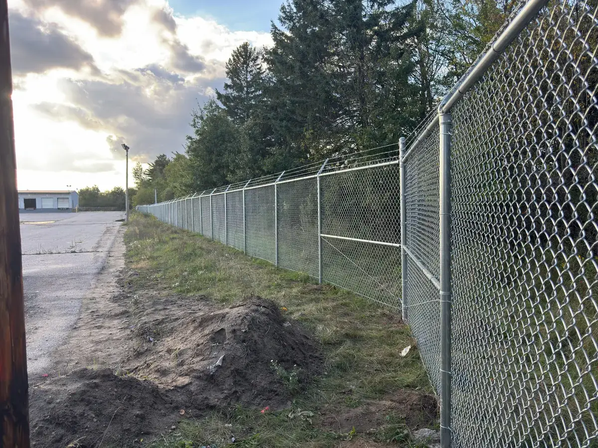 Secured commercial perimeter at sunset