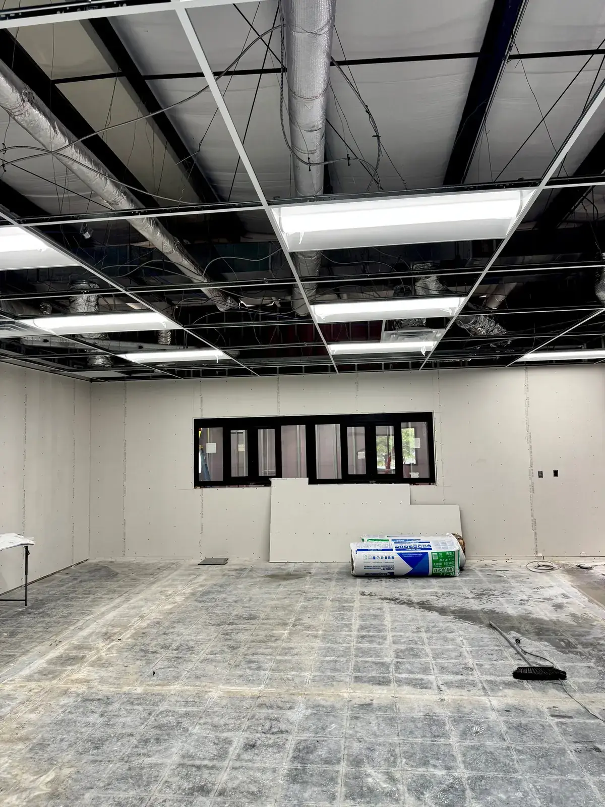Ceiling grid with lighting fixtures