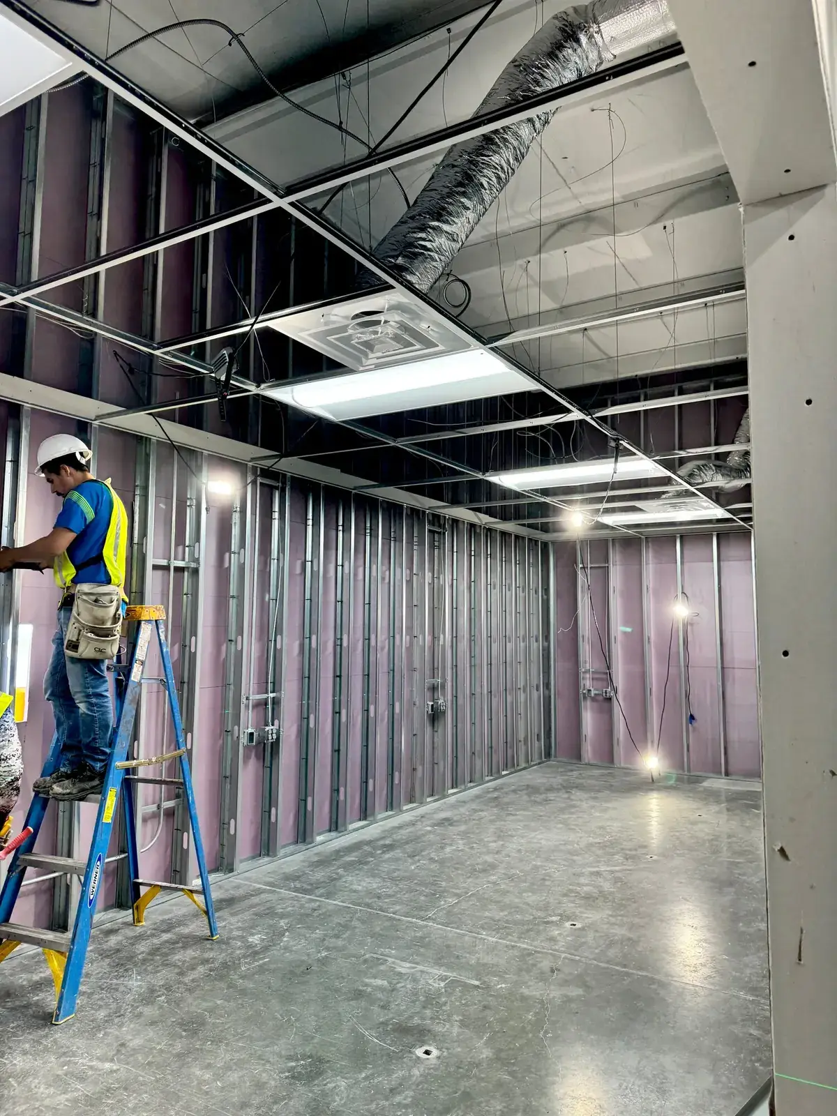 Electrician wiring a commercial build-out
