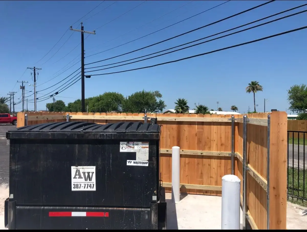 Cedar dumpster enclosure at a commercial site