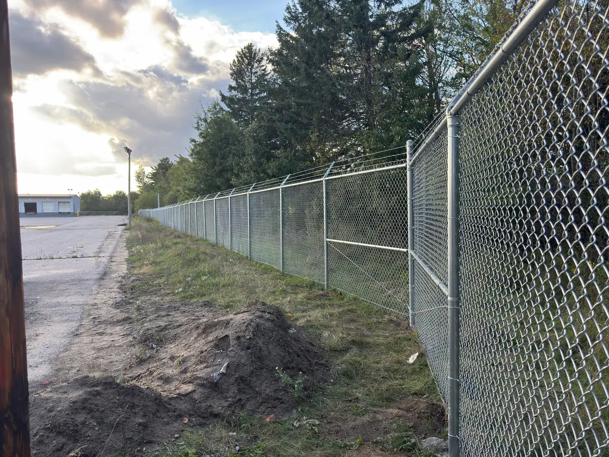 Secured commercial perimeter at sunset